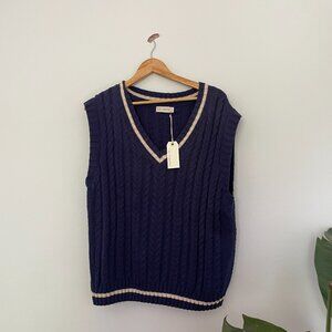 Blue and white sweater vest